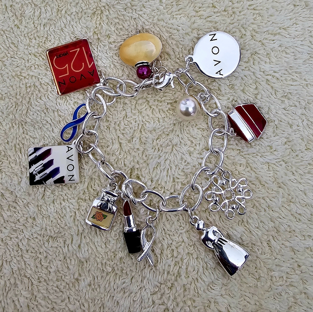 Avon Silver Charm Bracelet with Red and Blue Details